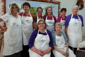 Ladies of the Pilgrim LWML Society sport their new aprons for the 2013 Fall Rally they hosted at Pilgrim. In the back row from left to right are Sallye Key, Sharon Sampson, Shannon Gage, Sarah Land, Elaine Navaille, and Barbara Wuthrich. In the front row from left to right are Angela Sampson and Jeanette Paetznick.