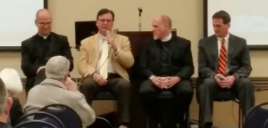 Rev. Darwood Galaway of Kilgore's First United Methodist Church answers a question from the audience while the other panelists listen intently (left to right, Rev. Daniel Dower, Rev. Dr. Jayson S. Galler, and Rev. Scott Nowack).