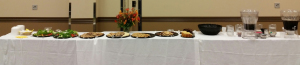 Refreshments during the break in the 2014 Symposium included fresh fruit and vegetables, cookies and cake, and iced tea and water. A free will offering helped offset Symposium expenses, and the four congregations represented split the remaining costs.