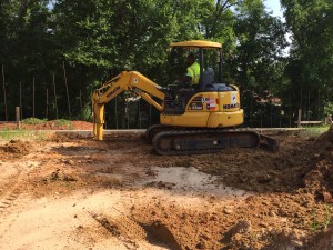 On May 6, 2016, crews excavated the backfill of the cracked foundation wall for the new Parish Hall in preparation for its demolition and reconstruction. Photo: Barbara Wuthrich.