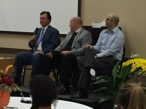 St. Luke’s United Methodist Pastor Darwood Galaway (left) responds to the presentation by Jeff Stanglin (right), while Pilgrim Lutheran’s Pastor Jayson Galler (center) listens intently. Photo: Barbara Wuthrich.