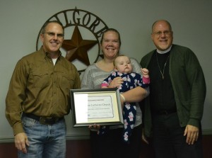 Chamber of Commerce Board of Directors Chairman Reece Nichols presented Pilgrim its Honorable Mention award. Receiving it are Jeanna and Lucy Watts and Pastor Galler. Photo: James Draper, Kilgore News Herald.